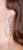 Σκουλαρίκια φο μπιζού μακριά με κρυστάλλους σε ασημί χρώμα BZ-ER-00302 φορεμένο στο αυτί