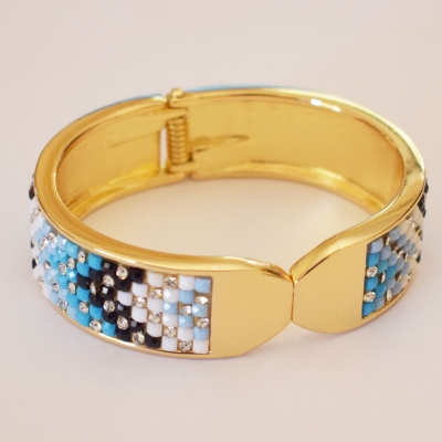 Bracelet faux bijoux brass with crystals in gold color BZ-BR-00337