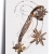 Earrings that hug the ear faux bijoux ear climbers star with white crystals in pale gold color BZ-ER-00434 Image 2