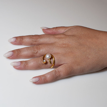 Handmade sterling silver ring 925o with gold plating and white pearls and white zirconia IJ-010189B Image 5 in hand