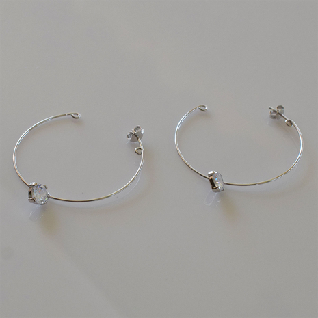 Handmade sterling silver earrings 925o hoops with silver plating and white zirconia IJ-020494A Image 4 in natural environment without special lighting